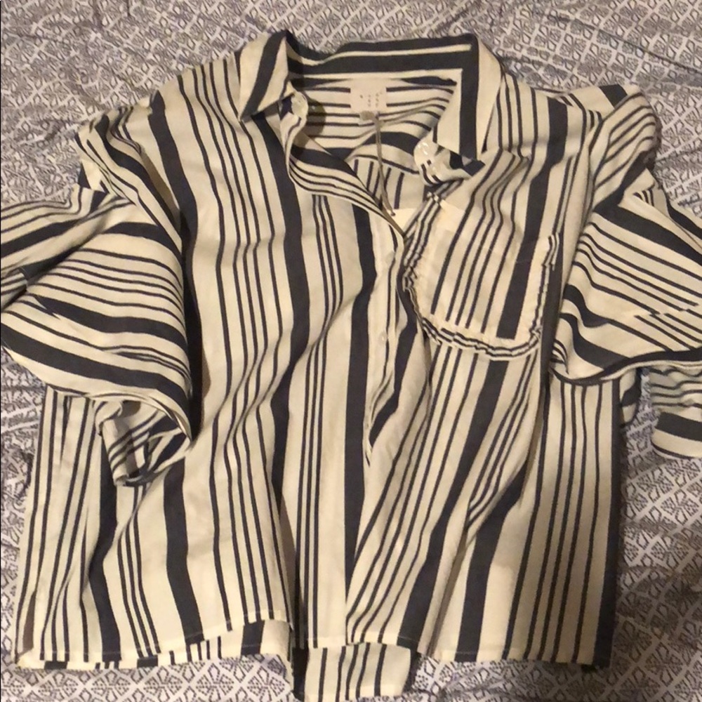 Ruffle sleeved button up blouse